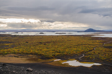 Traveling and exploring Iceland landscapes and famous places. Autumn tourism by Atlantic Ocean and mountains. Outdoor views on beautiful cliffs and travel destinations.
