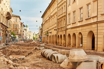 Extensive repair work on sewerage and water supply in the ancient streets of Europe. The road was...