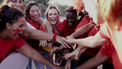 Sport fans support team in crowd stadium. Soccer of football celebrate championship games at event competition