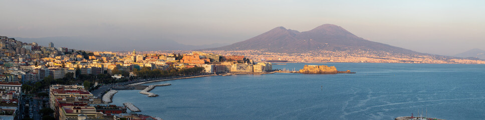 Fototapeta na wymiar The panorama of Naples in the evening light.