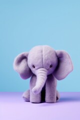 Purple felt plush elephant isolated