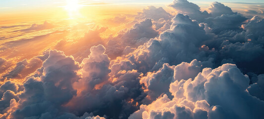 Fototapeta premium Sunrise above Clouds from Airplane