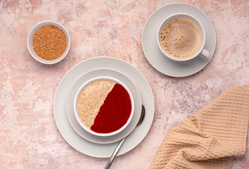 Food photography of oatmeal, porridge, raspberry, jam, fibre, coffee, cappuccino, flaxseed, vegan, wholegrain, brunch, breakfast