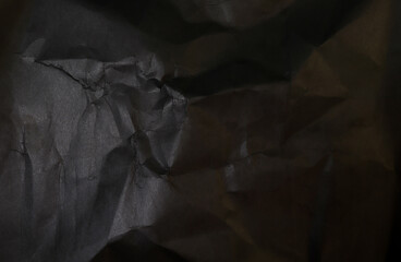black wrinkled paper texture. concept