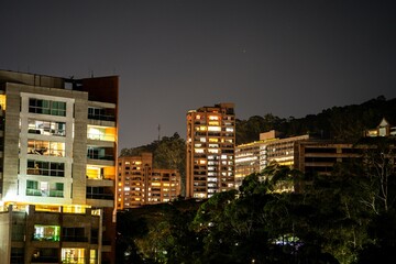 Fototapeta na wymiar night capture of multiple buildings in south american capital city