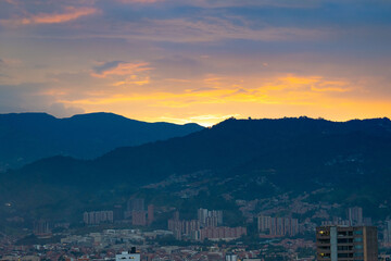 beautiful sunset with many colors on the horizon during dusk in south american metropolis