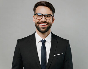 Adult confident attractive happy fun employee business man corporate lawyer he wearing classic formal black suit shirt tie work in office look camera isolated on plain grey background studio portrait.