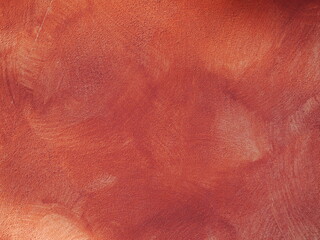 Fototapeta premium Red background of a painted wall with a fragment of a window. Italian style.