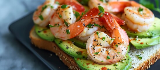Fresh avocado toast with shrimp, a healthy and vitamin-filled breakfast.
