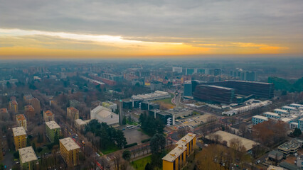Cityscape top view. Italian city view from a drone Sunset in cloudy weather, view from a drone of...
