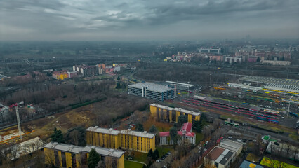 Cityscape top view. Italian city view from a drone Sunset in cloudy weather, view from a drone of...