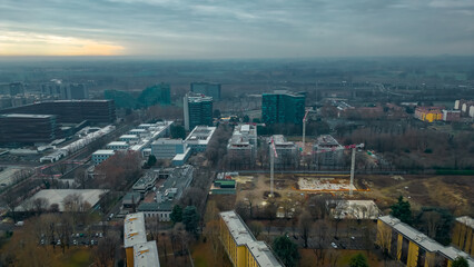 Cityscape top view. Italian city view from a drone Sunset in cloudy weather, view from a drone of...