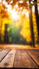 Naklejka na ściany i meble Wooden board empty table in front of blurred background. perspective brown wood table over blur trees in forest background - can be used mock up for display or montage your products. autumn season.