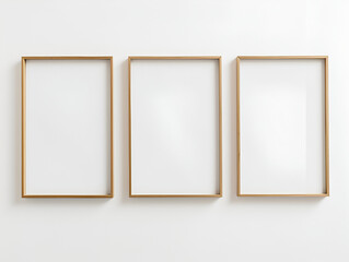 Empty picture frames hanging on a wall with bright natural lighting