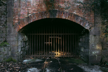 Dark entrance to a closed mine tunnel