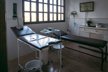 old doctor's office, with beds and medical instruments