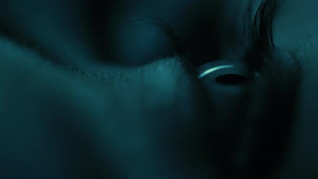 Male Eye Opening Super Macro Closeup at Night Blue Light