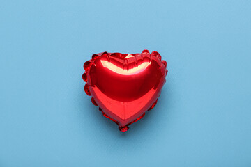 Heart shaped air balloon on blue background. Valentine's Day celebration