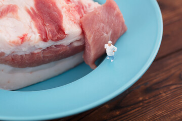 Microphotography of raw pork cooked by a chef on a plate