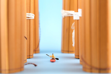 Miniature creative boating in bamboo slips between ancient books