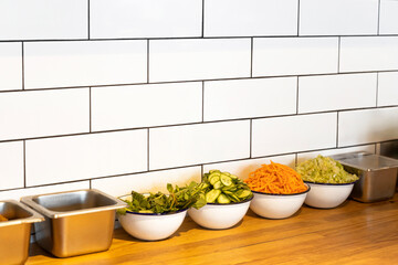 Bowls of Fresh Vegetables in Commercial Kitchen