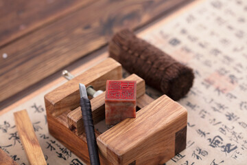 The engraved seal is fixed on the engraving bed