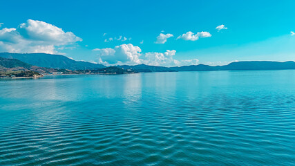 Blue sea with beautiful cliffs in Thailand Aerial view of paradise island, white sand beach Railway beach. hidden island,sea mountain sky