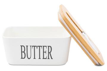 Butter Dish. Porcelain or ceramic butter dish with bamboo lid. Covered white dish with butter knife...