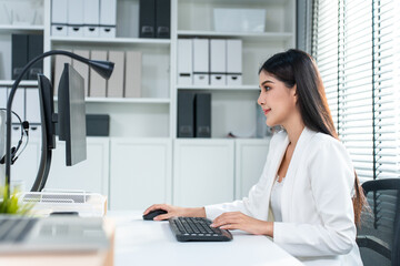 Obraz na płótnie Canvas Asian beautiful businesswoman using laptop computer working in office. 