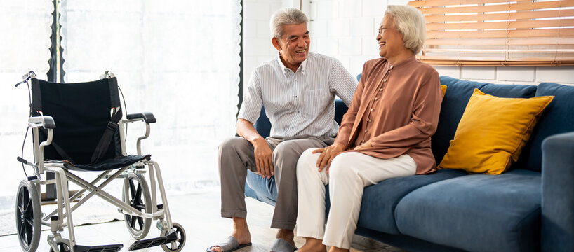 Asian attractive senior woman support and talking with elderly man. 