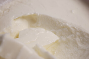 fresh yogurt in a bowl on table 