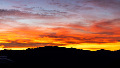 colorful dramatic sky with cloud at sunset