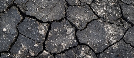 Fototapeta premium Cracked asphalt texture for background design.