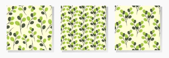 Black branches with green leafs on ivory background. Floral seamless patterns collection.