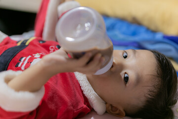 Joyful Kids Spreading Holiday Cheer in Christmas Costumes