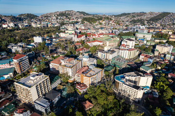 Baguio City, Philippines - An expansive aerial shot capturing the dense architecture and vibrant...