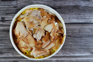 Pieces of Chicken shawarma with yellow Basmati rice, Syrian bread and garlic sauce, selective focus...