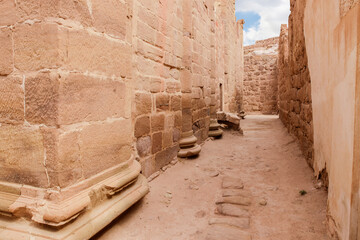 One of the narrow city streets in the Roman part of the Nabataean Kingdom of Petra in the Wadi Musa city in Jordan