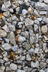 Gravel multi colored stone background. Different size stones.