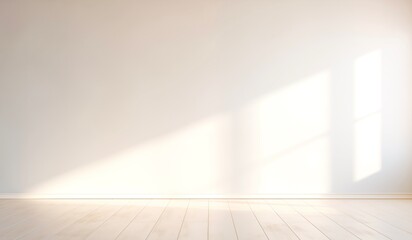 Obraz premium Sunlight on a white wall for product presentation and emphasizing a clean and well lit setting suitable for showcasing products.