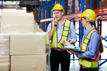 factory workers working and checking corrugated box in the warehouse storage