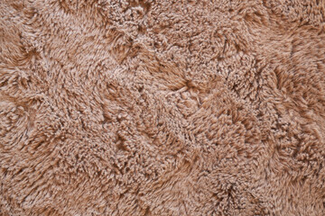 Brown fur texture background. Top view and close up.