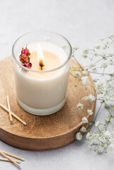 Aromatic candle on the table.