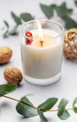 Aromatic candle on the table.