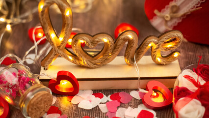 Valentine's day and holiday background. The word Love on a wooden table