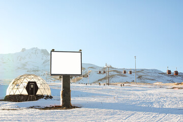 Blank billboard mockup for advertising, at the mountain ski resort.
