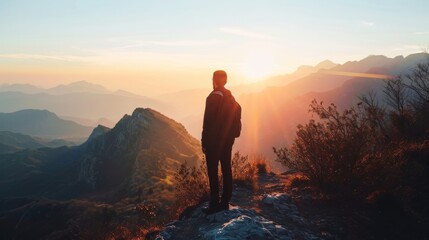 business male stand and feel happy on the most hight on the mountain, hiking, success, cliff, peak, business, success, successful, goal, victory, achievement, motivation,