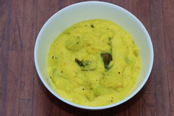 Majjige huli is a South Indian food prepared with milk curd, It typically includes vegetables in a buttermilk gravy.