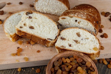 sweet bun with golden raisins, closeup