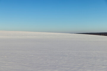 drifts of white pure snow after a snowfall, beautiful white snow